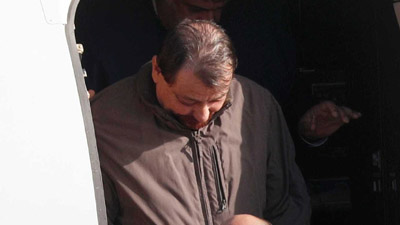 Battisti se diz mudado e doente, relatam policiais que o acompanharam