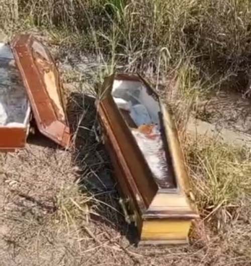Caixões são abandonados em estrada e PC investiga se houve violação de túmulos