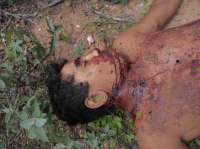 Corpo crivado de balas é encontrado em assentamento 