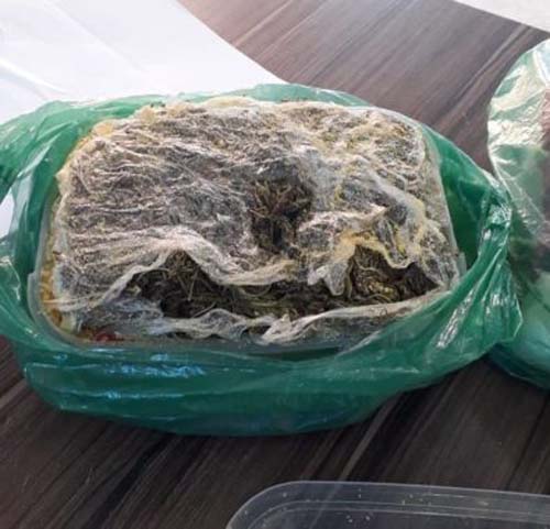 Mulher é flagrada tentando entrar em presídio de Maceió com maconha escondida em marmita