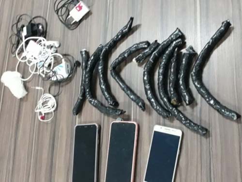 Policial penal é preso tentando entrar com celular e droga no sistema prisional