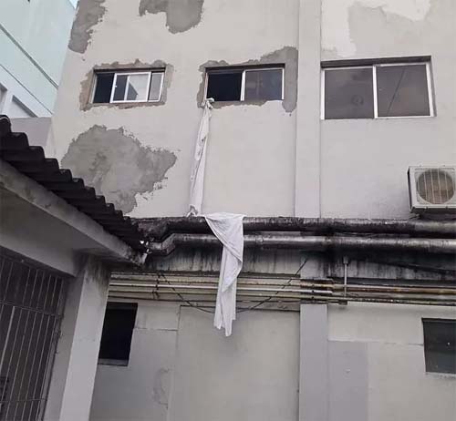 Preso internado após trocar tiros com a PM escala parede com corda de lençóis e foge do HGE