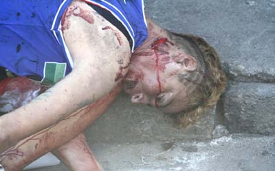 Mulher é esquartejada até a morte em via pública