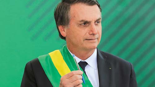 Bolsonaro critica ajuda a famílias de presos e promete rever regras