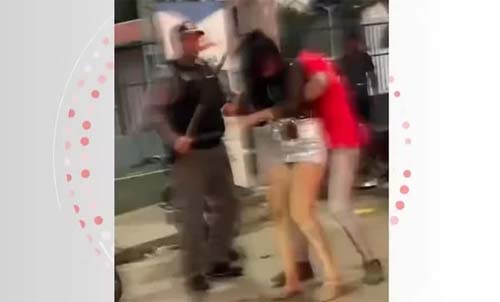 Policial é filmado agredindo mulher com puxões de cabelo e pedaço de madeira em festa junina em Batalha